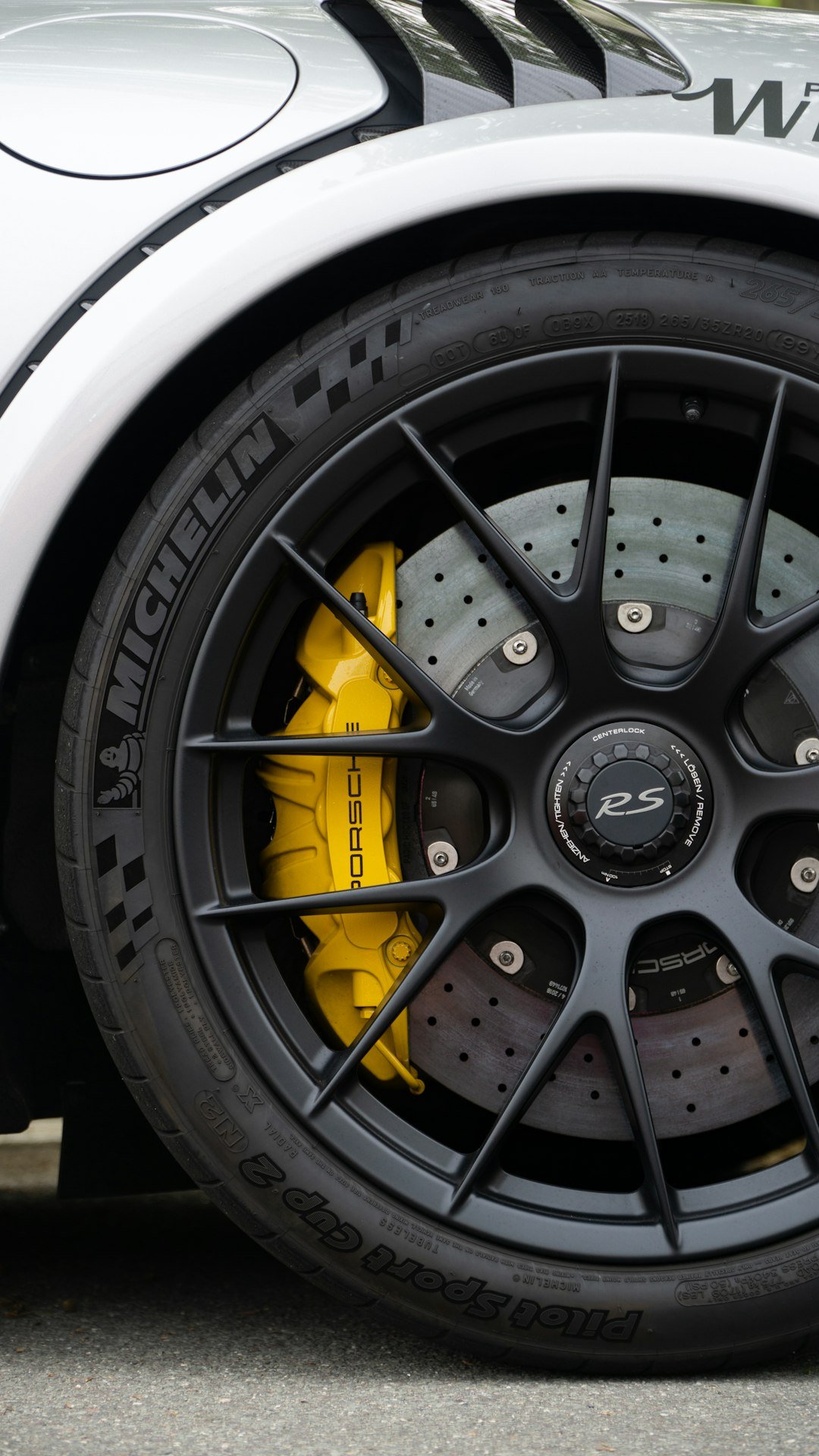 a-close-up-of-a-tire-on-a-sports-car-nvk5wd-c9s